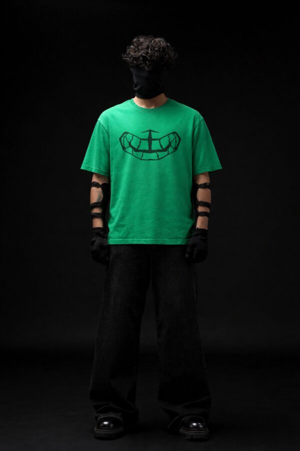 Green oversized t-shirt for men with turtle face inspired chest graphic – The Unobvious Winner by Toobvius (front view)