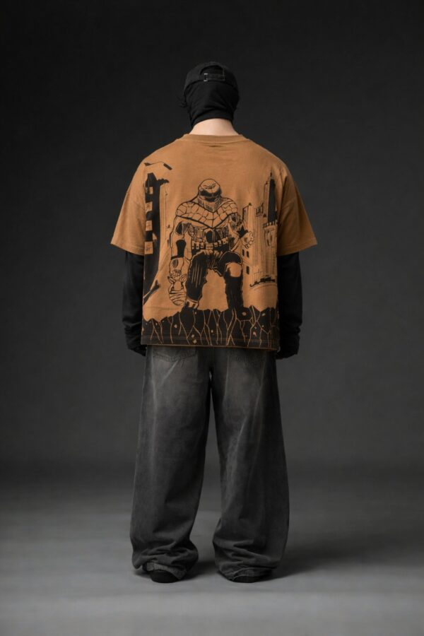 Brown oversized t-shirt back view with bold black superhero graphic design