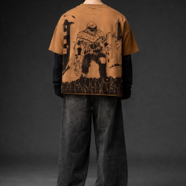 Brown oversized graphic t-shirt back view with bold black artwork