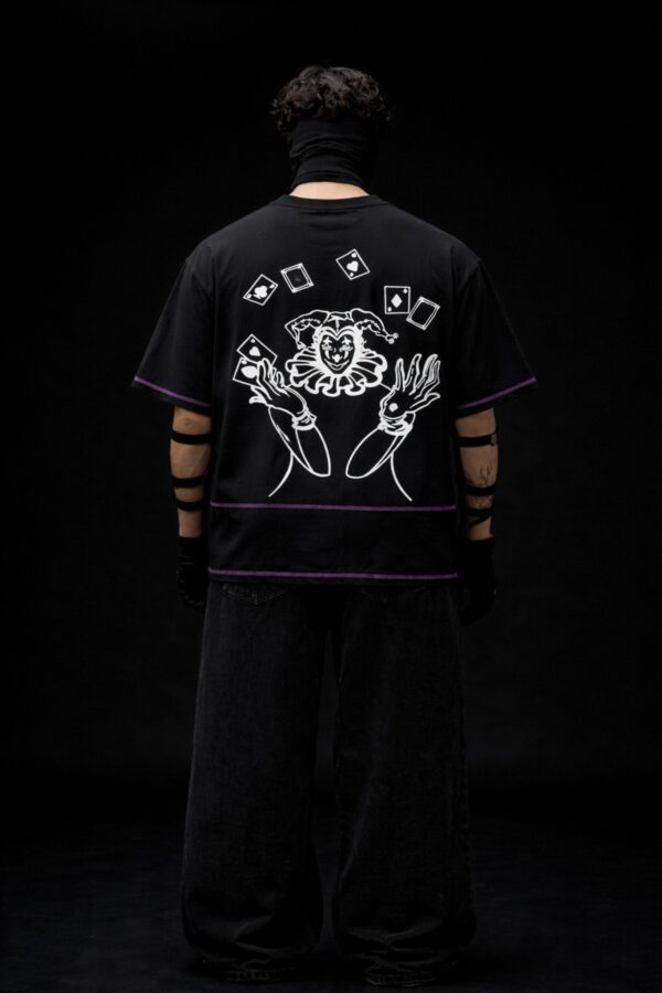 Black oversized t-shirt back design with joker graphic and playing cards, Prince of Chaos streetwear by Toobvius