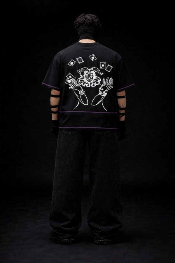 Black oversized t-shirt back design with joker graphic and playing cards, Prince of Chaos streetwear by Toobvius