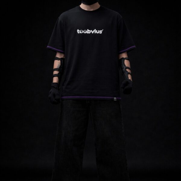 Black oversized t-shirt with Toobvius logo print on front, purple stitch detailing, streetwear fashion India