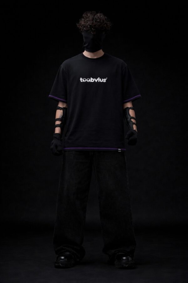 Black oversized t-shirt with Toobvius logo print on front, purple stitch detailing, streetwear fashion India