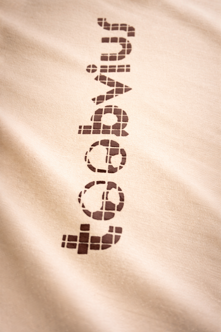 Close-up of Toobvius logo inspired by analog music equalizer bars on Noise Meets Structured Equalizer reglan oversized t-shirt